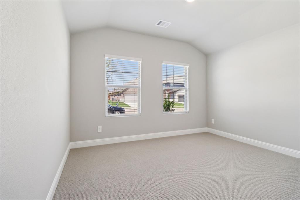 2101 Rannoch Street Sherman, TX 75092 - Photo 24 of 36 an empty room with windows