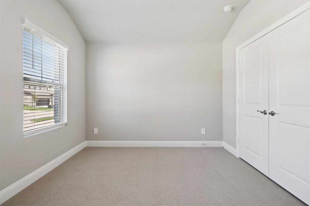 2101 Rannoch Street Sherman, TX 75092 - Photo 25 of 36 a view of an empty room with a window