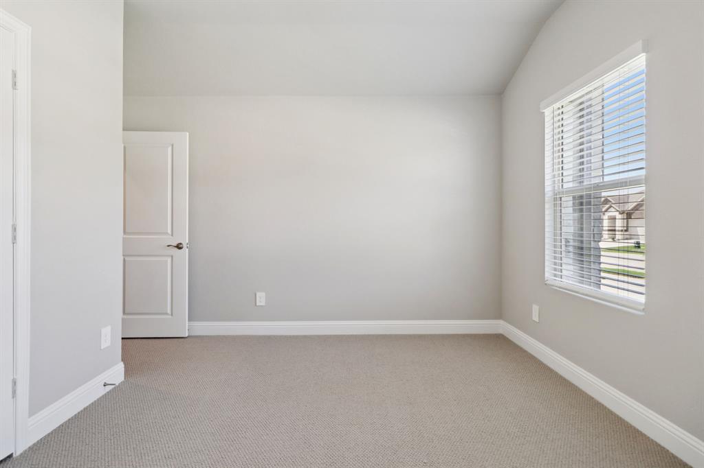 2101 Rannoch Street Sherman, TX 75092 - Photo 26 of 36 an empty room with a window