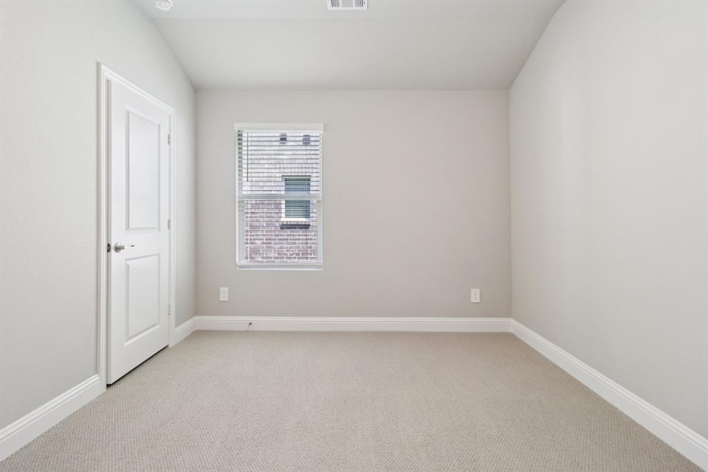 2101 Rannoch Street Sherman, TX 75092 - Photo 28 of 36 an empty room with a window