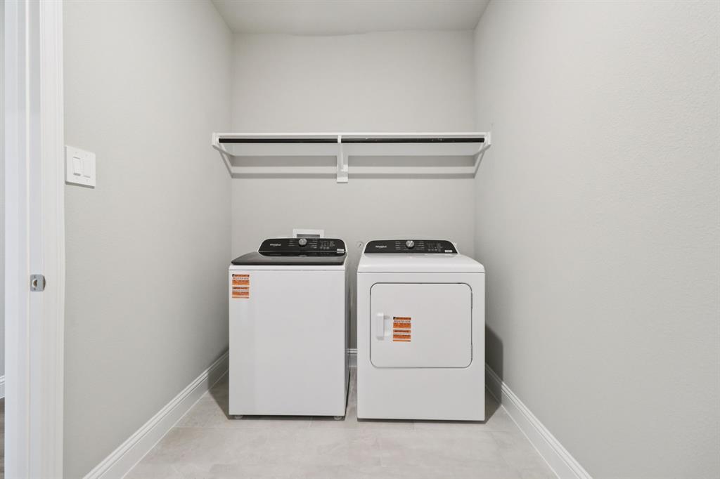 2101 Rannoch Street Sherman, TX 75092 - Photo 35 of 36 a utility room with dryer and washer