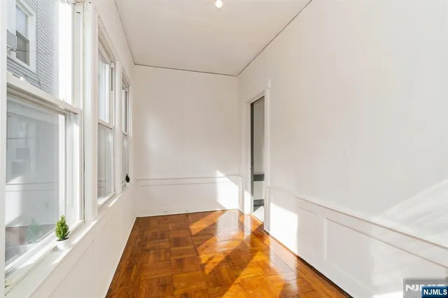 a bathroom with a tub and shower