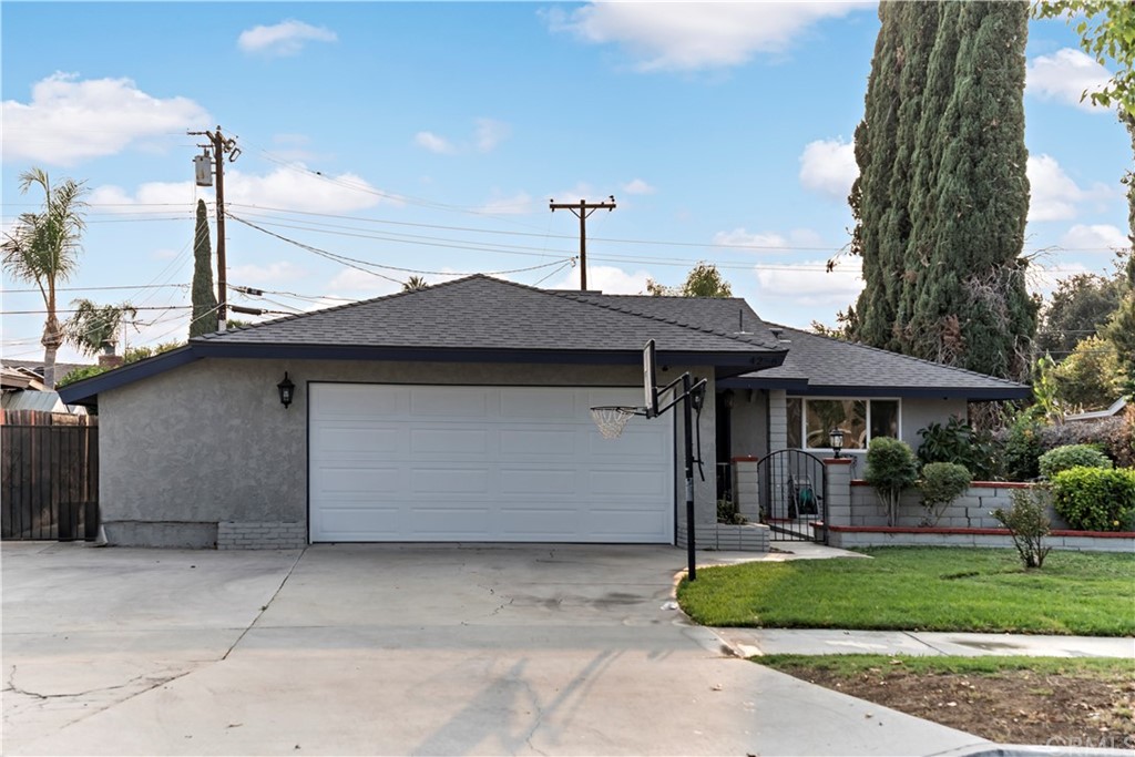 4256 Lido Drive Riverside, CA 92503 - Photo 1 of 1 a front view of a house with swimming pool having outdoor seating