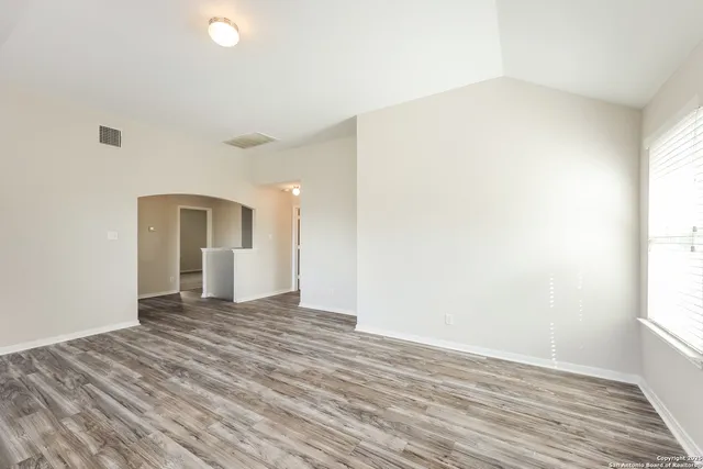 a view of an empty room and window