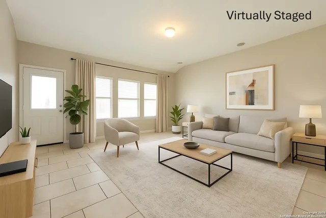 a living room with furniture and a window