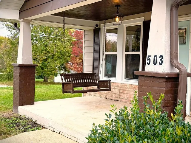 a view of a porch with a door