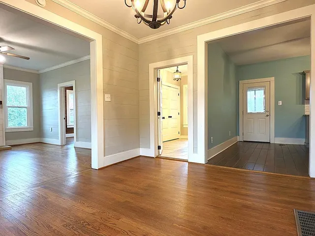 a bathroom with a glass door shower