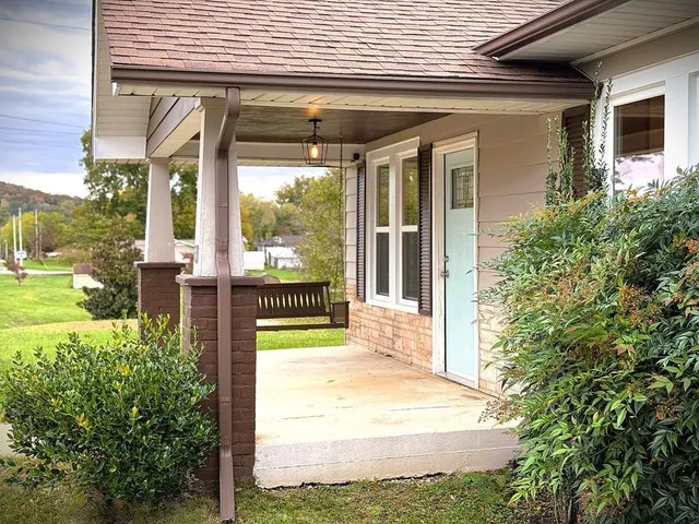 a view of swimming pool with patio