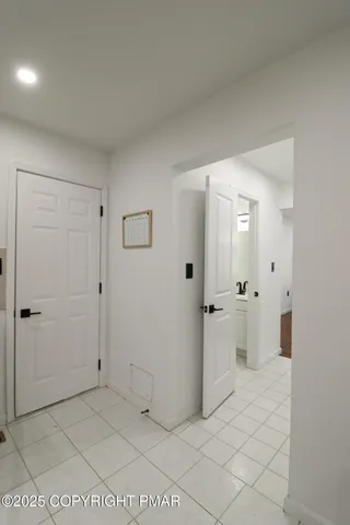 a bathroom with a sink and vanity