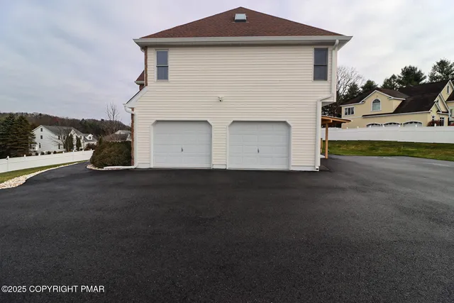 a view of a street with big yard