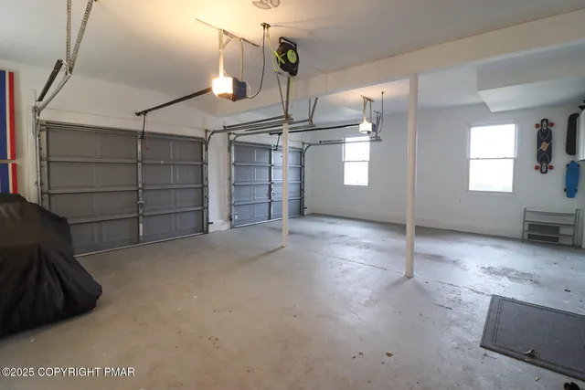 a view of a house with wooden floor and fence