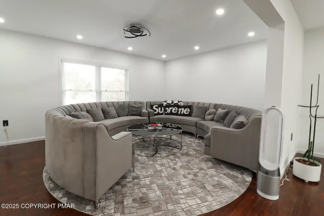 a living room with furniture and a couch