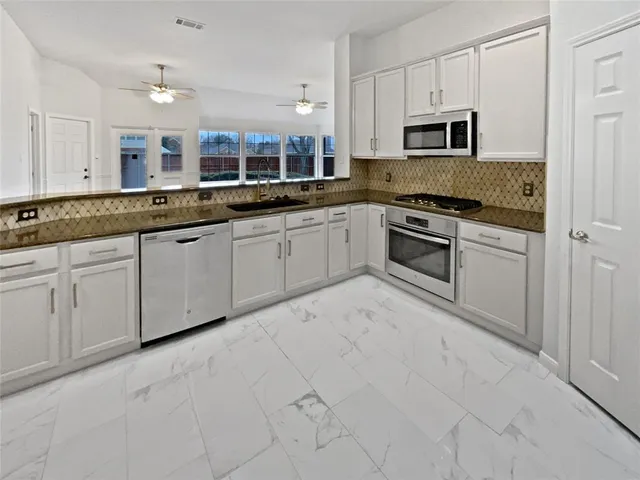 $452,000 | 3856 Pine Valley Drive, Plano, TX 75025