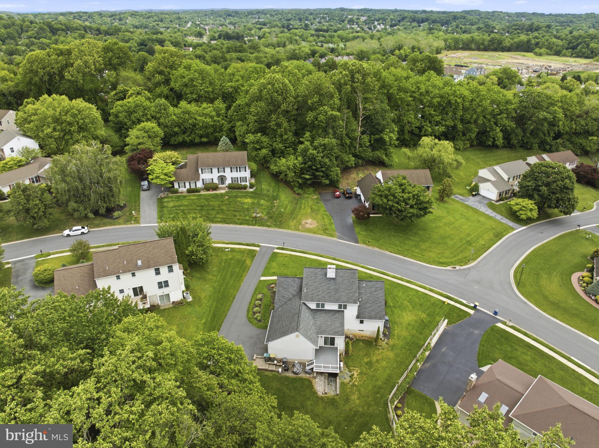 736 Letitia Drive Hockessin, DE 19707 - Photo 86 of 92 an aerial view of a house with outdoor space swimming pool lake view and mountain view