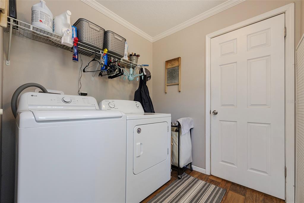 2100 East Kicklighter Road Lake Helen, FL 32744 - Photo 33 of 61 a utility room with dryer and washer