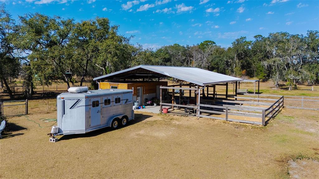 2100 East Kicklighter Road Lake Helen, FL 32744 - Photo 49 of 61 an outdoor space with seating