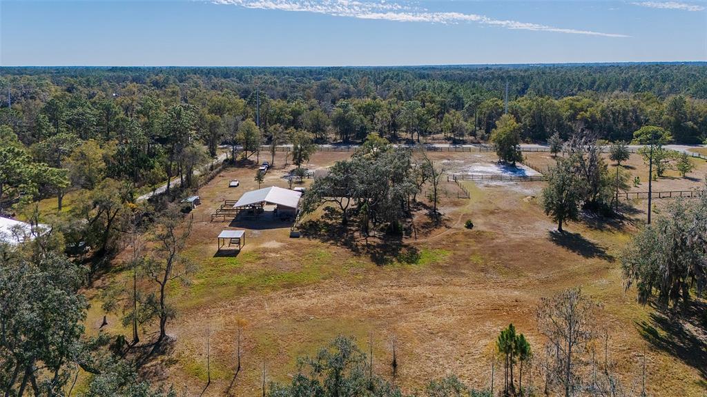 2100 East Kicklighter Road Lake Helen, FL 32744 - Photo 58 of 61 a aerial view of a house with a yard