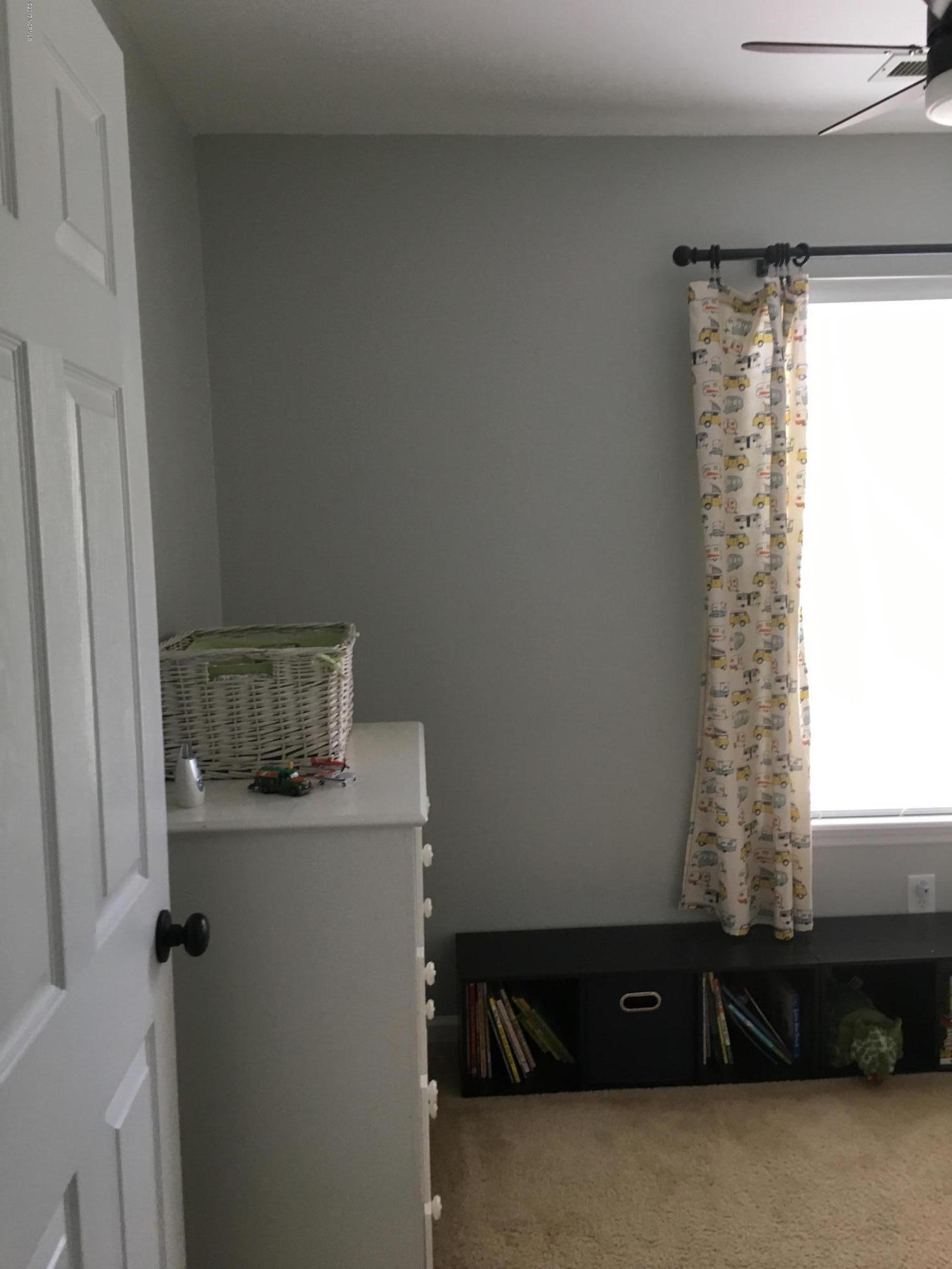 326 Masters Lane Hampstead, NC 28443 - Photo 18 of 27 2 upstairs bedroom