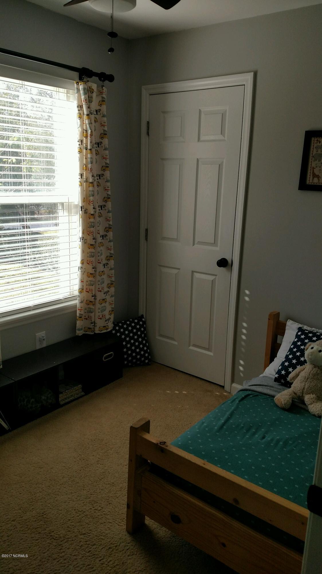 326 Masters Lane Hampstead, NC 28443 - Photo 19 of 27 2 upstairs bedroom
