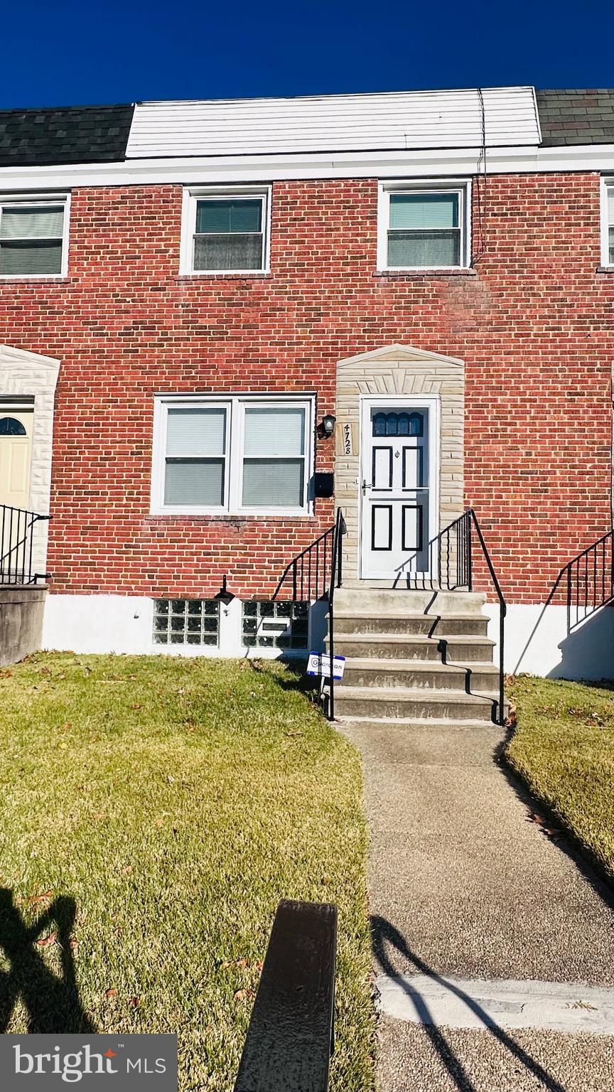 4728 Chatford Avenue Baltimore, MD 21206 - Photo 1 of 36 a front view of a house with garden