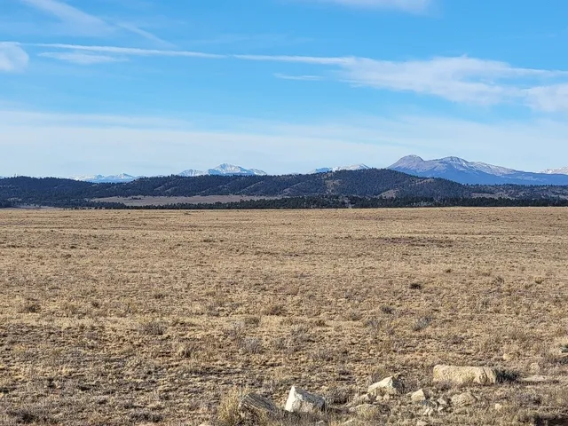 a view of lake and mountain