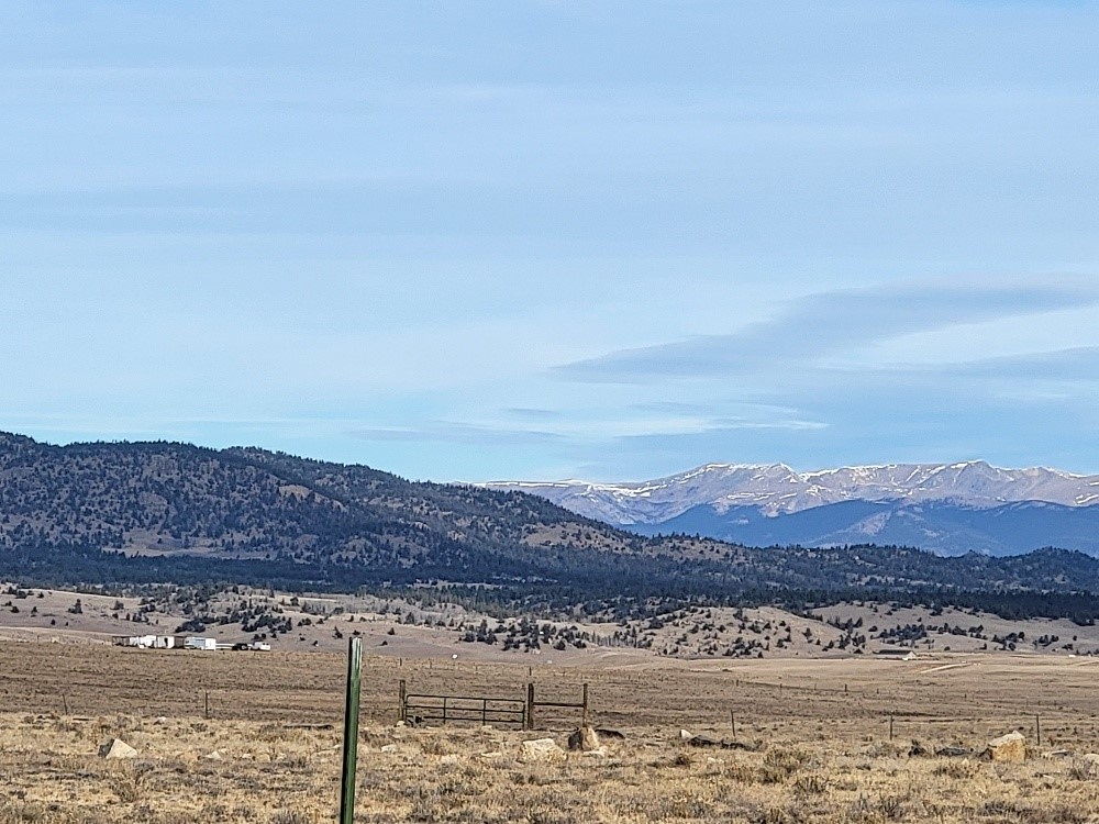 1162 Rocky Mountain Road Hartsel, CO 80449 - Photo 11 of 45 a view of an ocean and a mountain