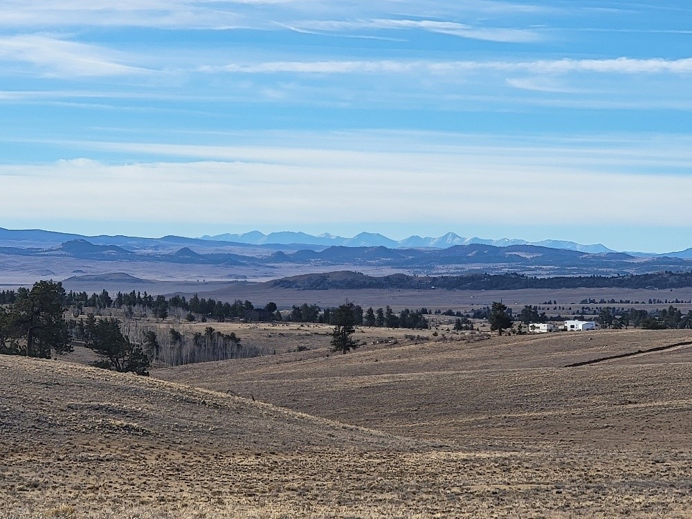 1162 Rocky Mountain Road Hartsel, CO 80449 - Photo 22 of 45 a view of an ocean and a mountain