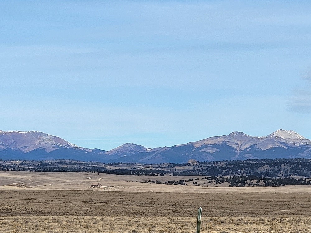 1162 Rocky Mountain Road Hartsel, CO 80449 - Photo 10 of 45 a view of a house with a mountain