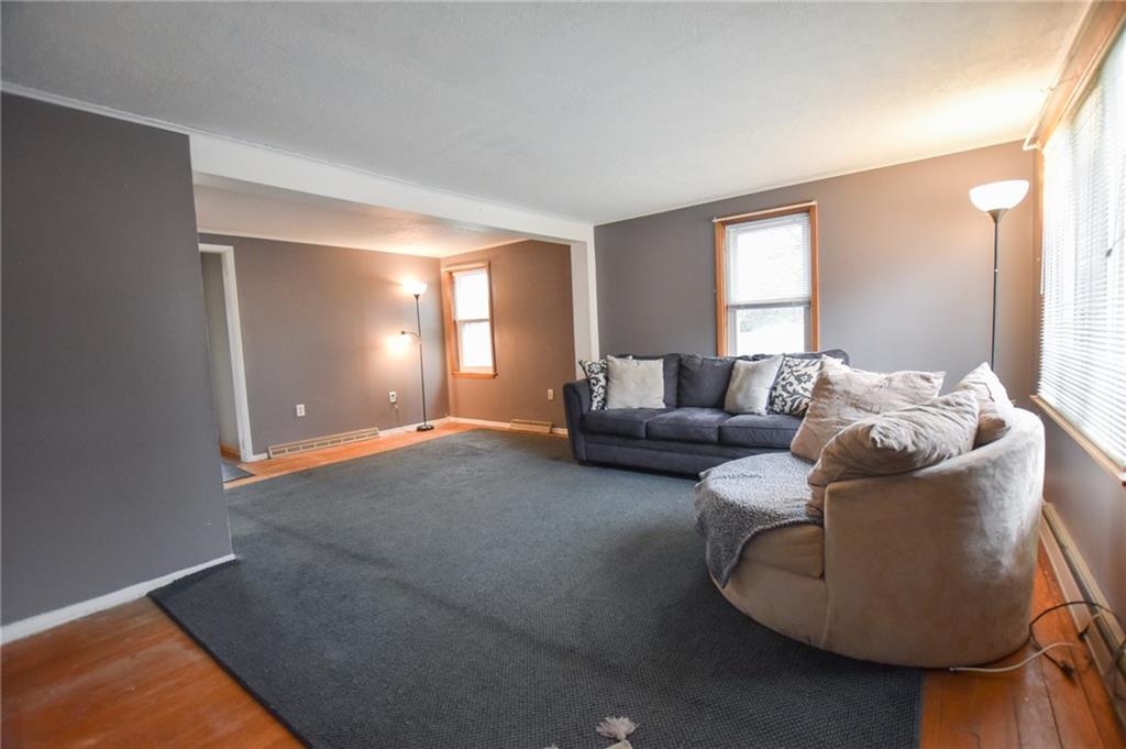 811 Saxonburg Road Butler, PA 16002 - Photo 2 of 13 a living room with furniture and a window