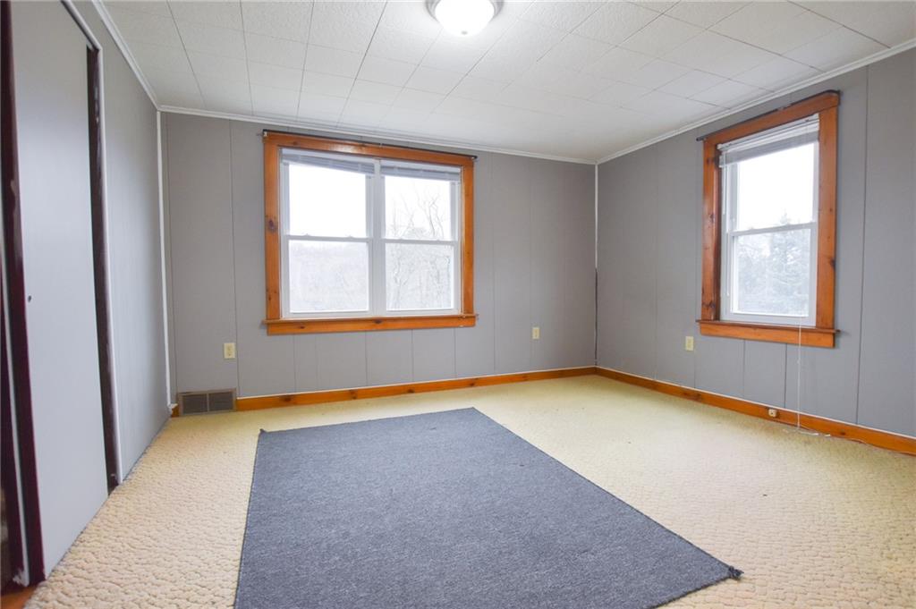 811 Saxonburg Road Butler, PA 16002 - Photo 5 of 13 an empty room with windows