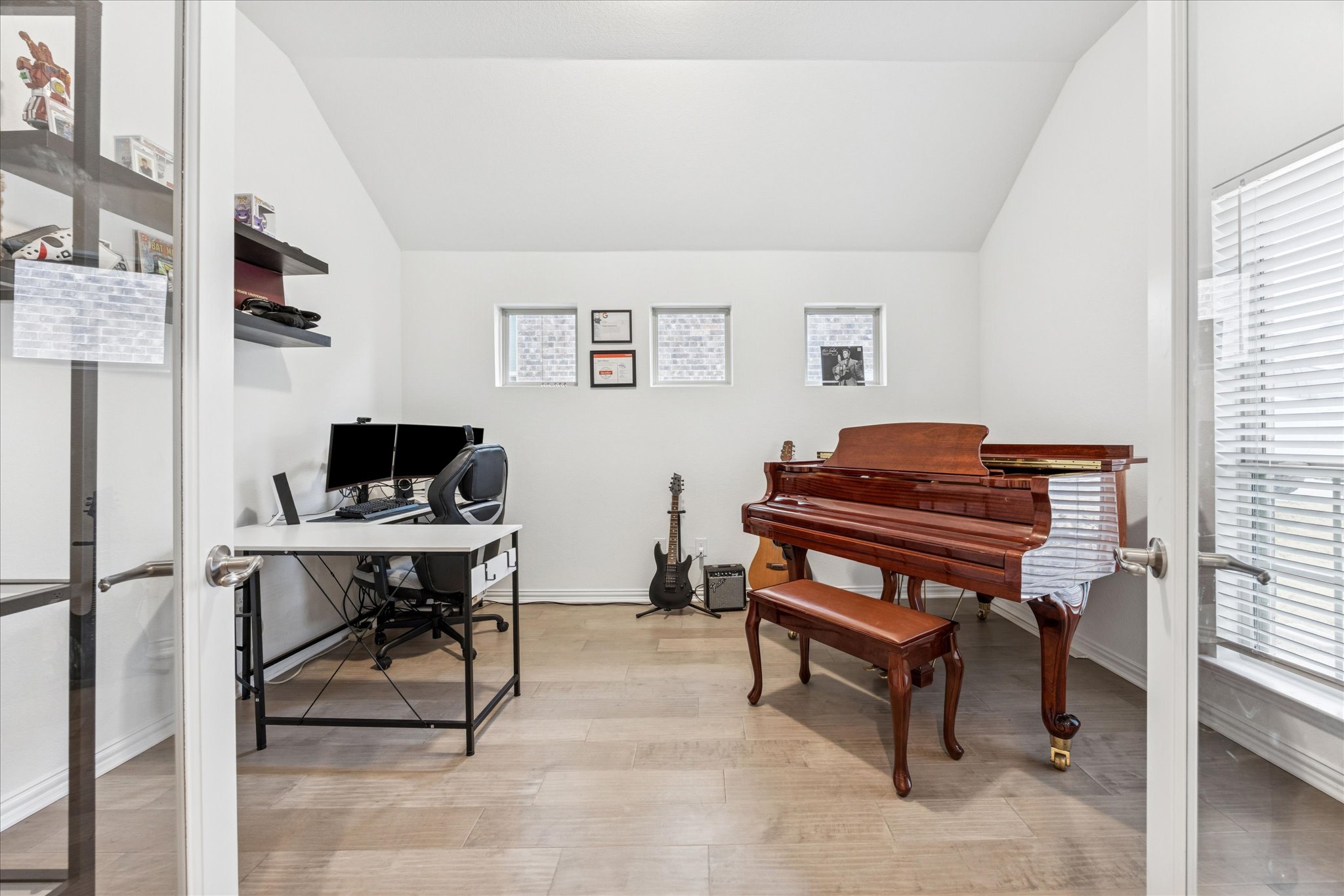 540 Sugar Cane Buda, TX 78610 - Photo 3 of 11 Office space with french doors, lofted ceiling, and light wood-style flooring