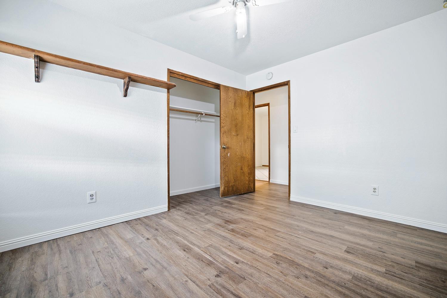43036 Jacalitos Creek Road Coalinga, CA 93210 - Photo 28 of 85 a view of an empty room with wooden floor