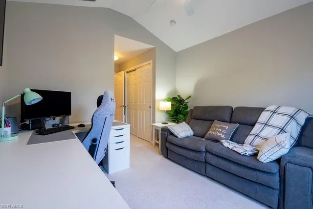 a view of a hallway with a room