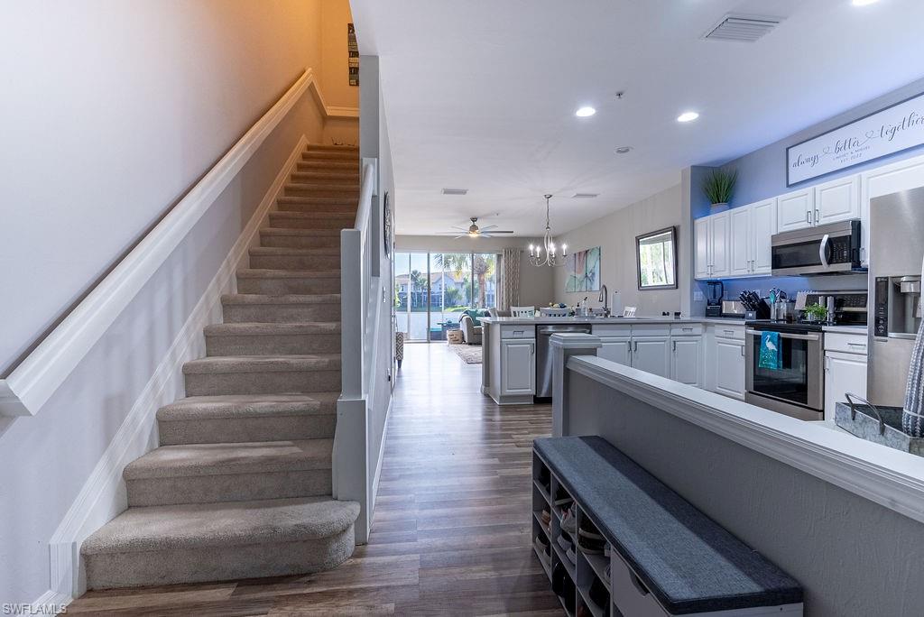 15792 Marcello Circle, Unit 182 Naples, FL 34110 - Photo 27 of 50 a view of kitchen with sink and microwave