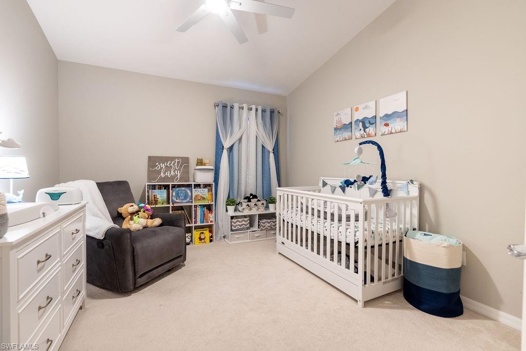 15792 Marcello Circle, Unit 182 Naples, FL 34110 - Photo 32 of 50 a room with furniture and white walls