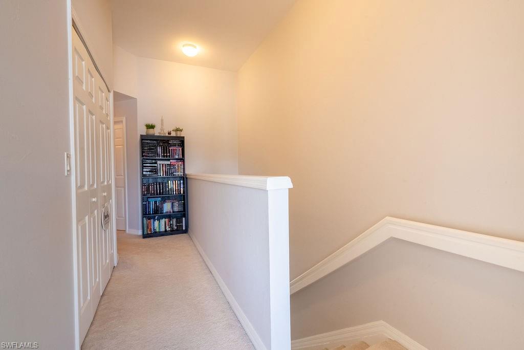 15792 Marcello Circle, Unit 182 Naples, FL 34110 - Photo 34 of 50 a view of wooden floor and entryway