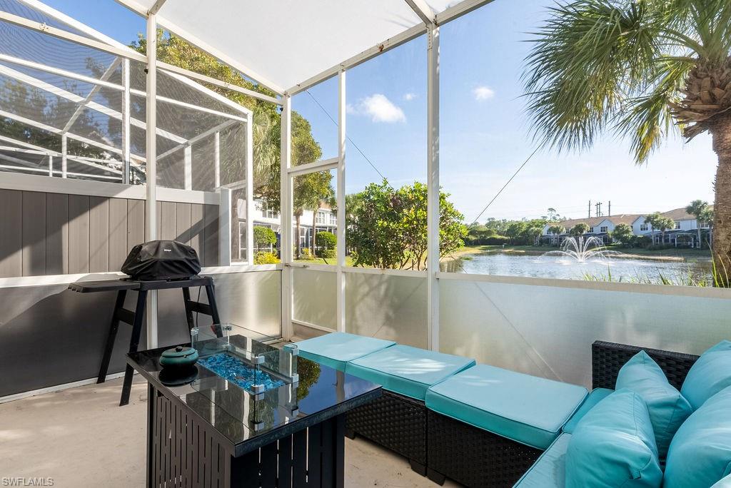 15792 Marcello Circle, Unit 182 Naples, FL 34110 - Photo 44 of 50 a view of a balcony with furniture and a potted plant