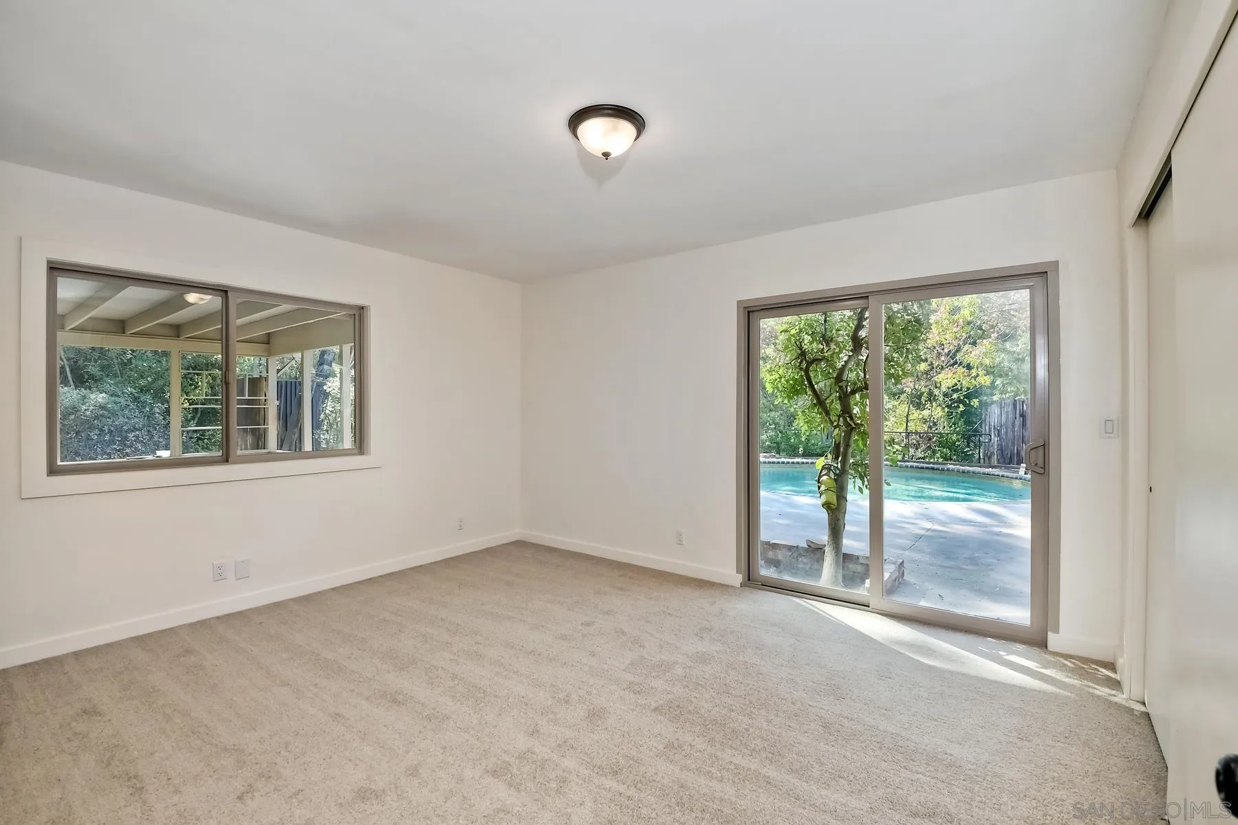 13541 Willow Run Road Poway, CA 92064 - Photo 16 of 40 a view of an empty room with a window