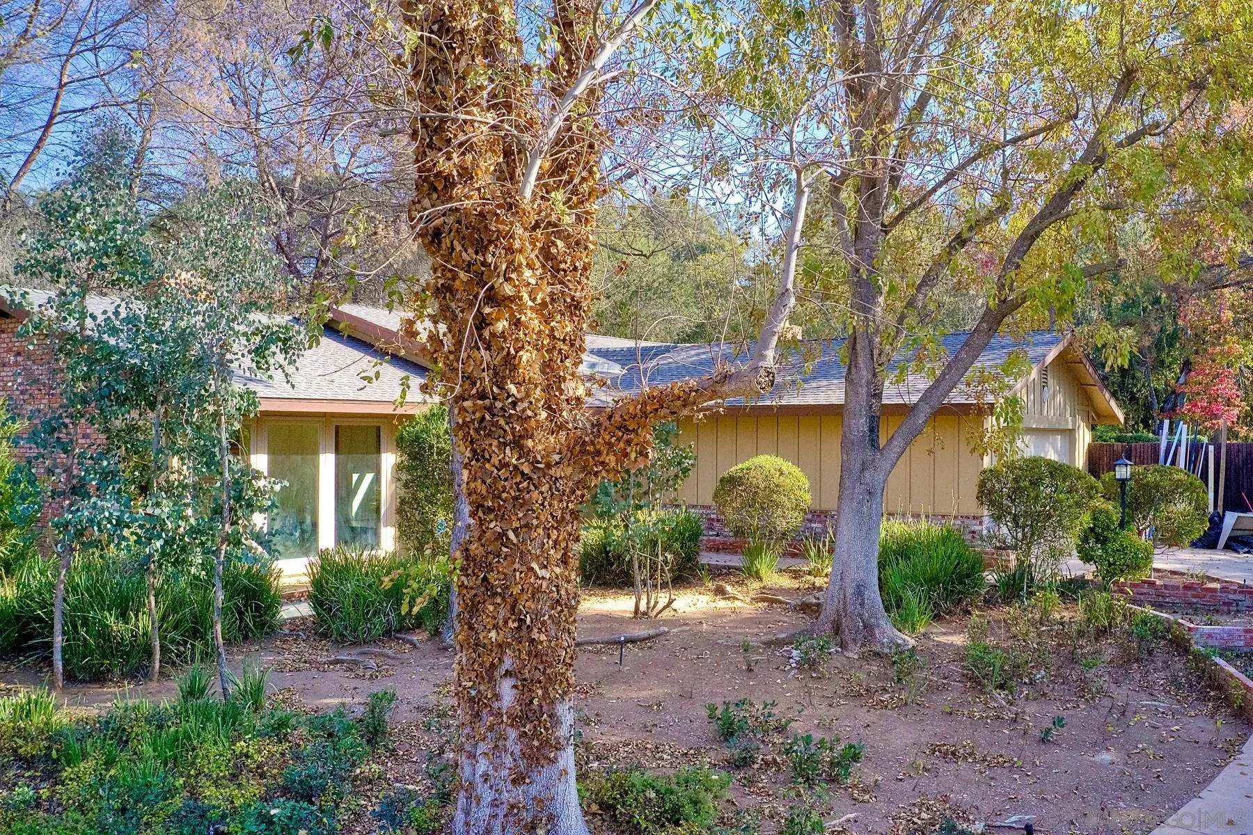 13541 Willow Run Road Poway, CA 92064 - Photo 32 of 40 a front view of a house with garden