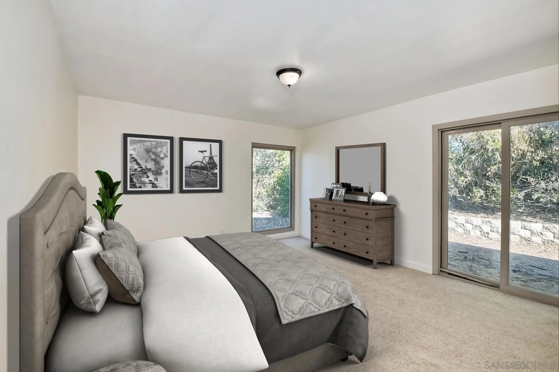 13541 Willow Run Road Poway, CA 92064 - Photo 37 of 40 a bedroom with a bed and a large window