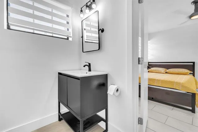 a bathroom with a bathtub and shower