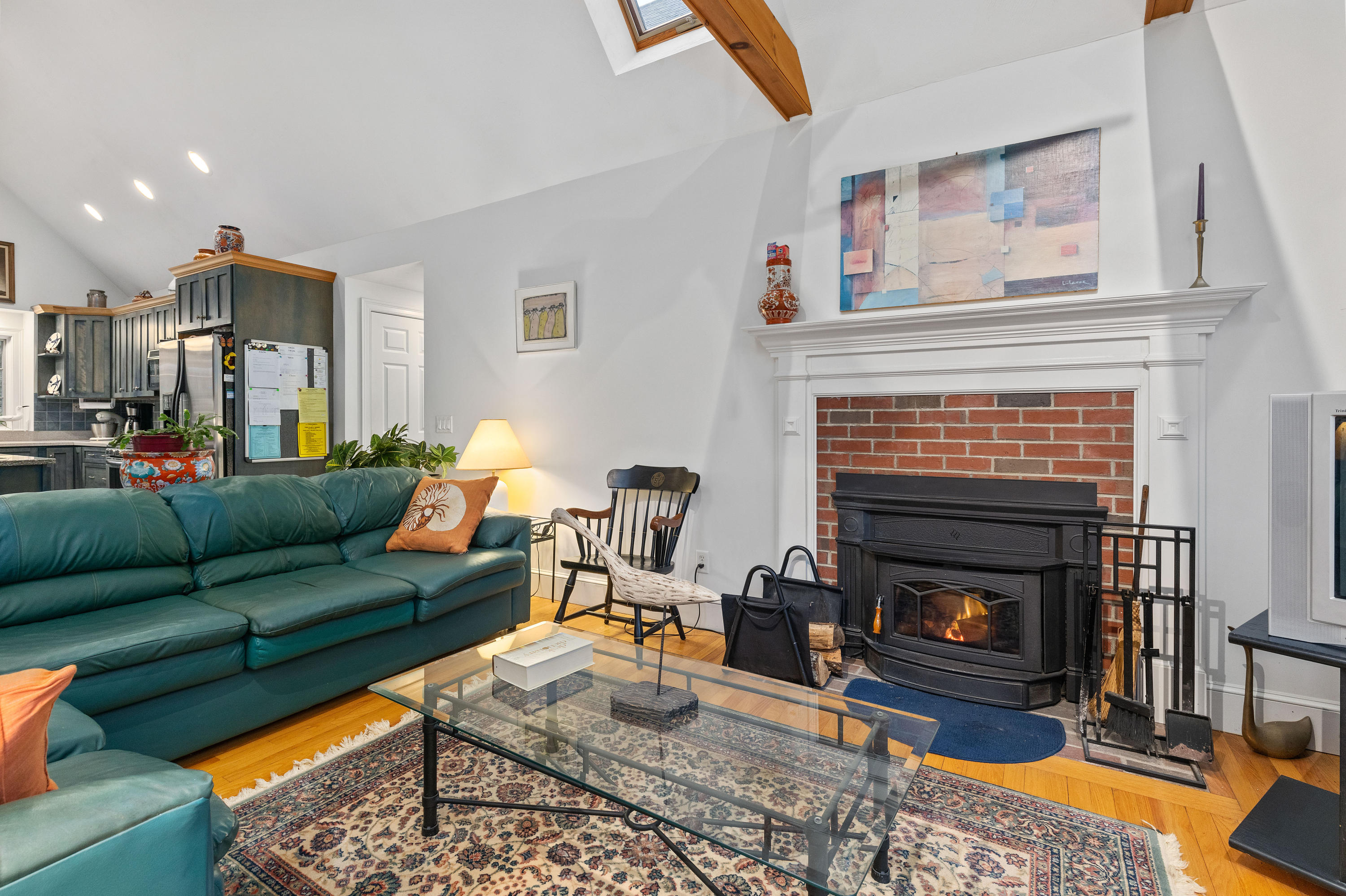 3 Parsons Path Harwich, MA 02645 - Photo 13 of 62 a living room with furniture and a fireplace