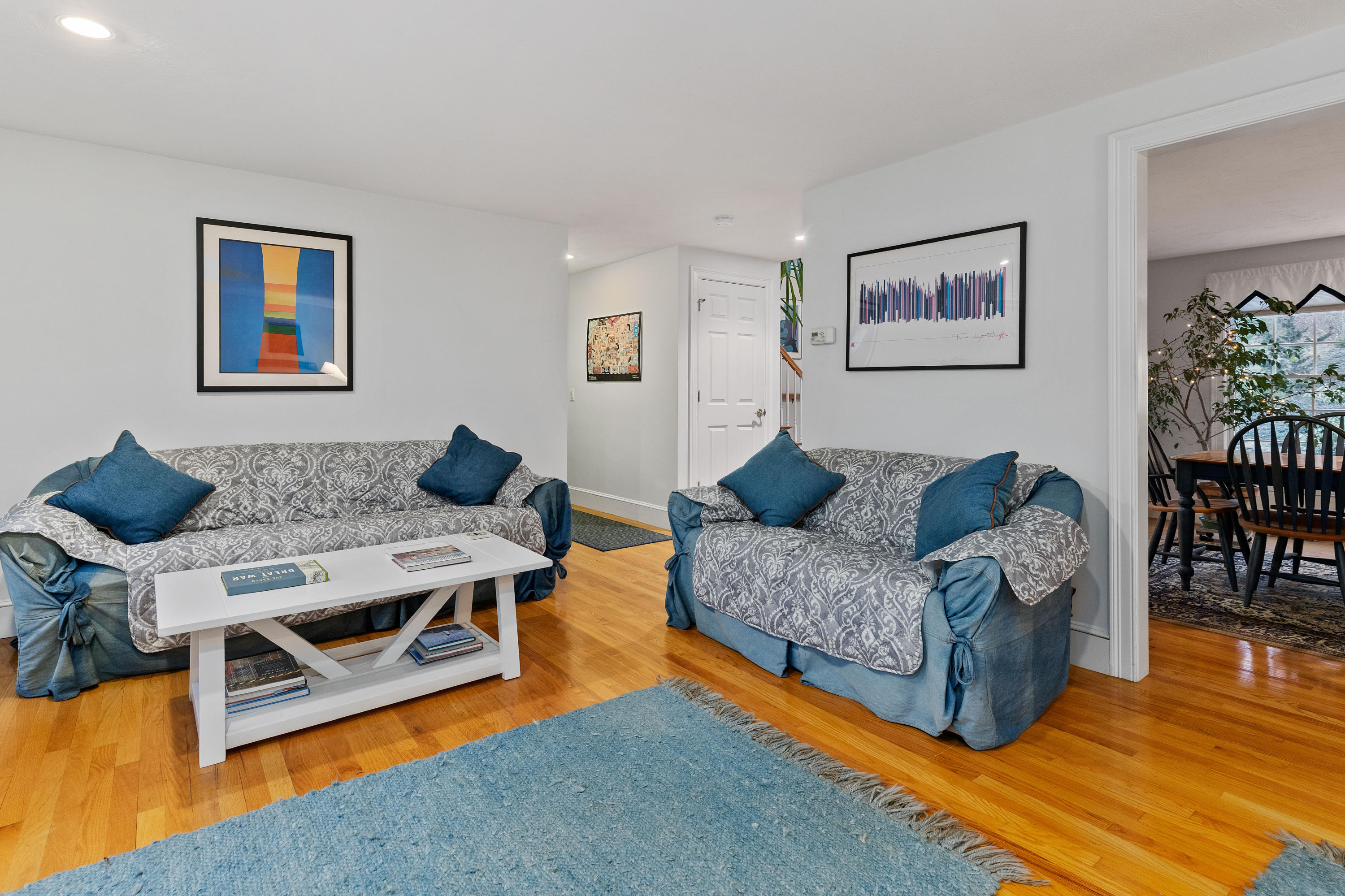 3 Parsons Path Harwich, MA 02645 - Photo 15 of 62 a living room with furniture and a wooden floor
