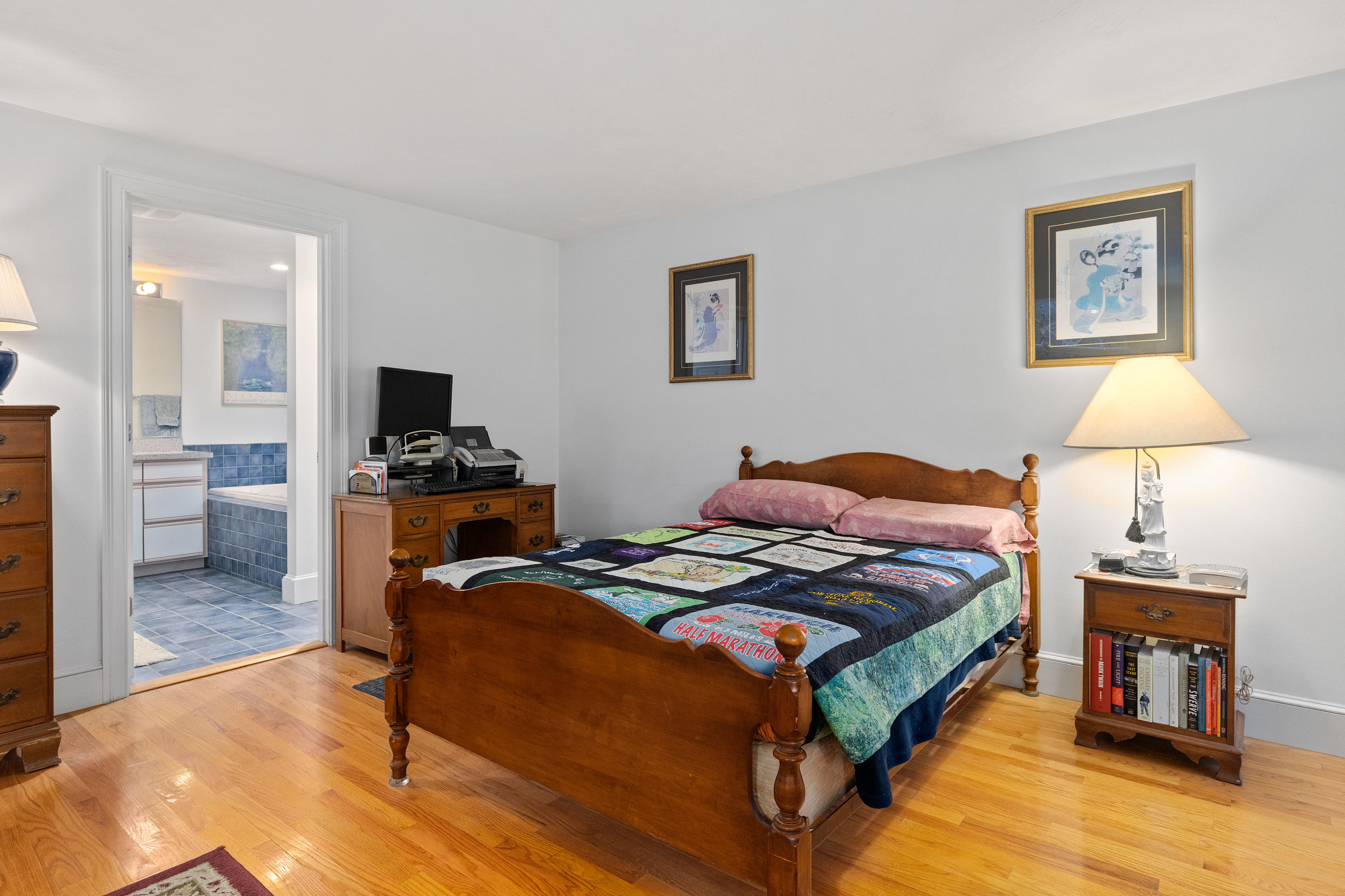 3 Parsons Path Harwich, MA 02645 - Photo 22 of 62 a bedroom with a bed and a view of kitchen