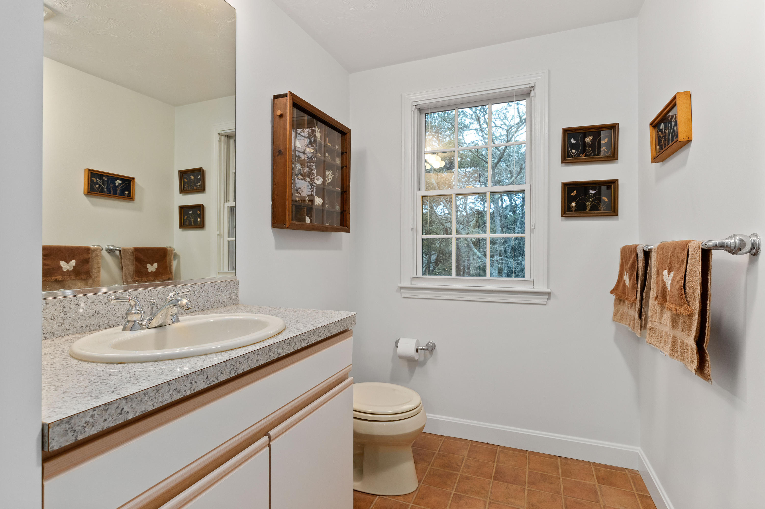 3 Parsons Path Harwich, MA 02645 - Photo 30 of 62 a bathroom with a granite countertop sink and a mirror