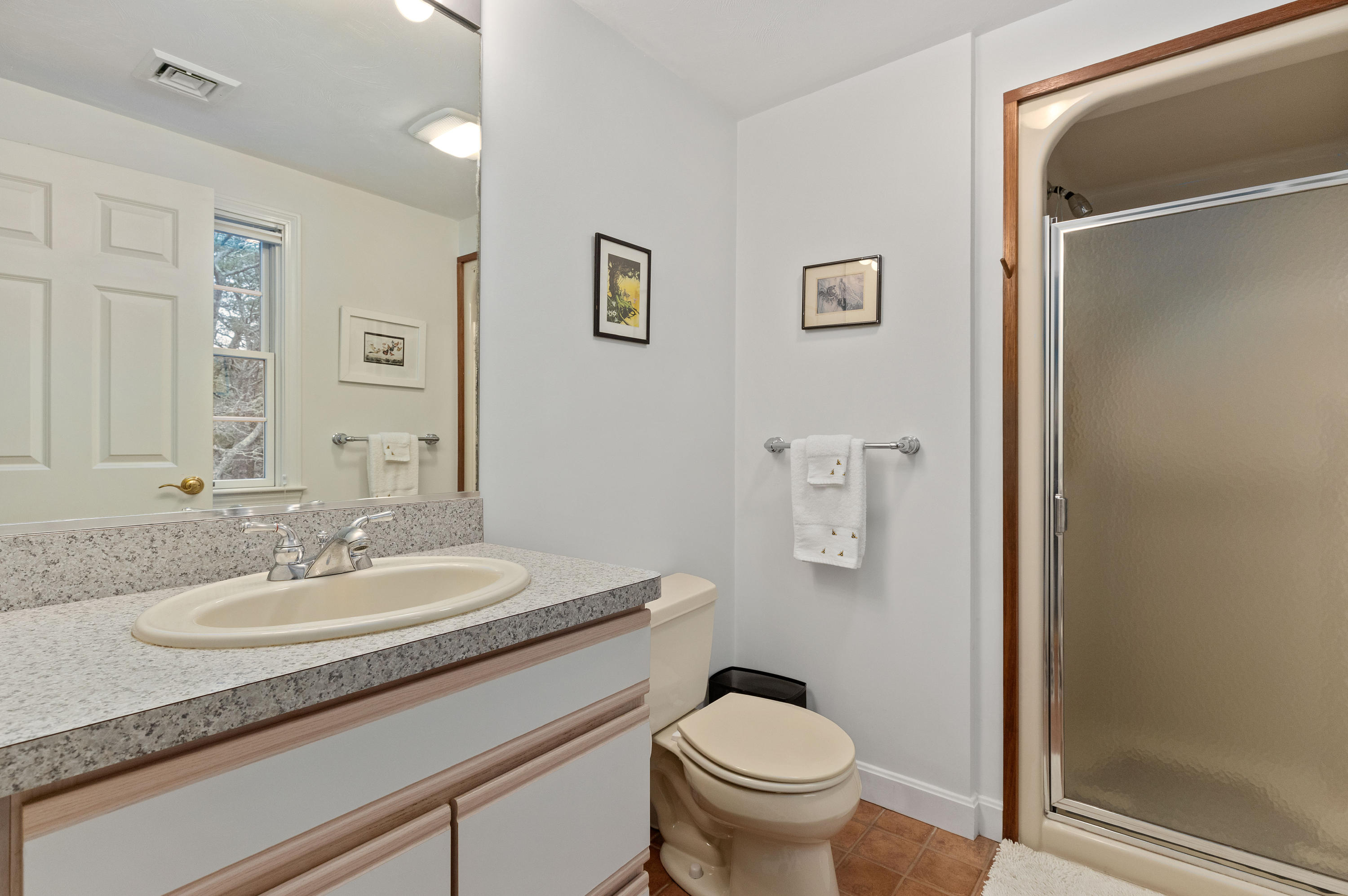 3 Parsons Path Harwich, MA 02645 - Photo 33 of 62 a bathroom with a granite countertop sink toilet and shower