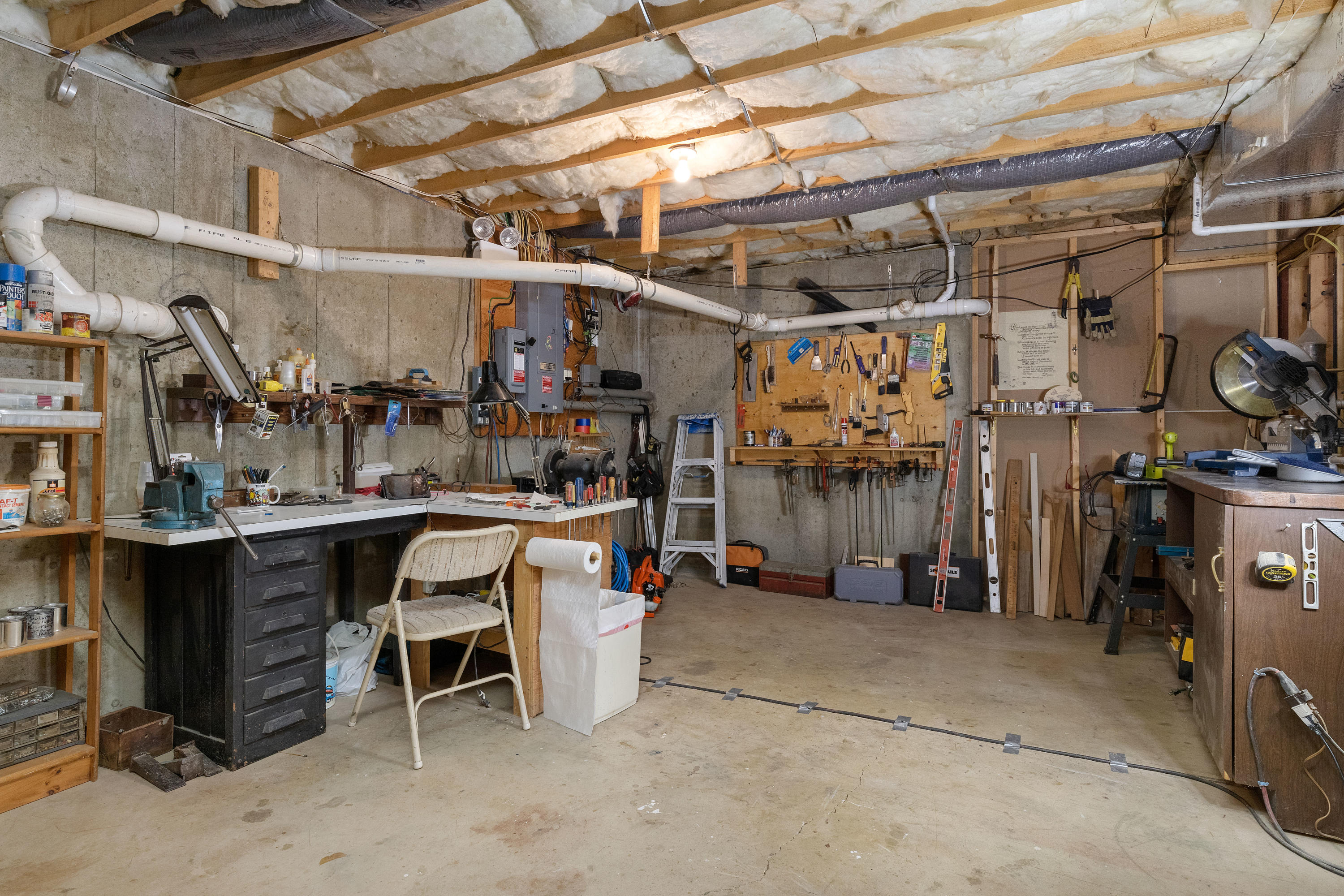 3 Parsons Path Harwich, MA 02645 - Photo 42 of 62 a view of a storage room with a table and chairs