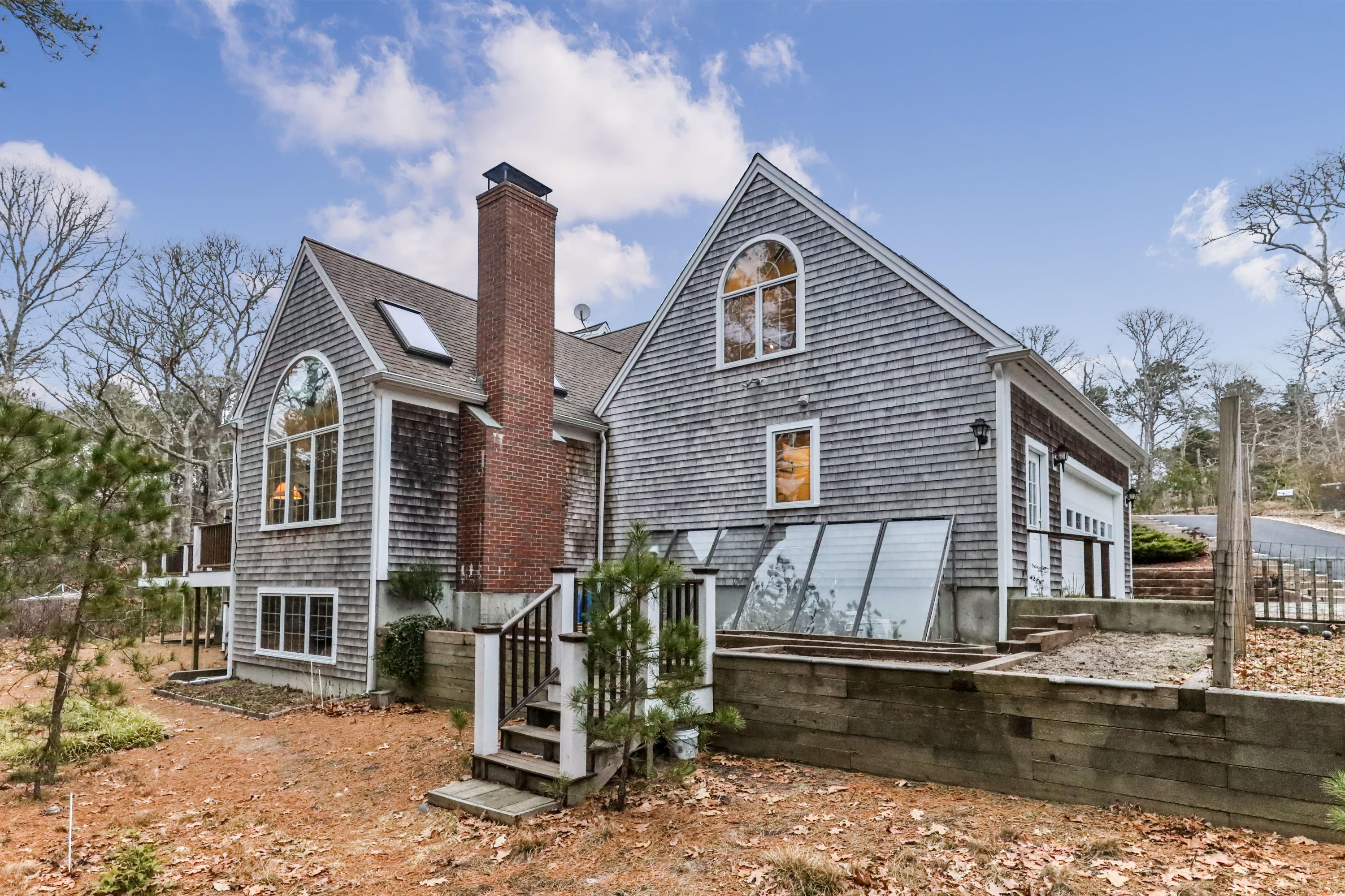 3 Parsons Path Harwich, MA 02645 - Photo 49 of 62 a front view of a house with garden