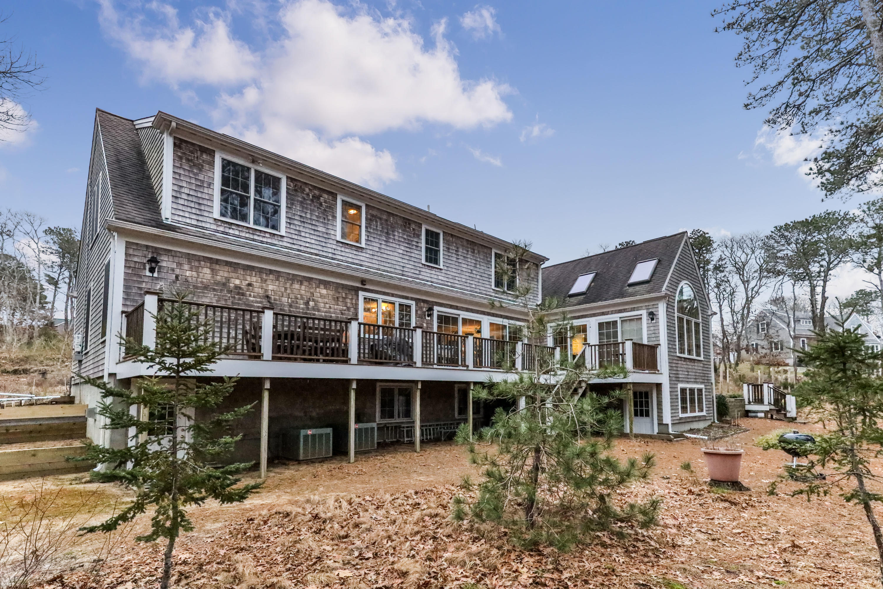 3 Parsons Path Harwich, MA 02645 - Photo 50 of 62 a front view of a house with a garden
