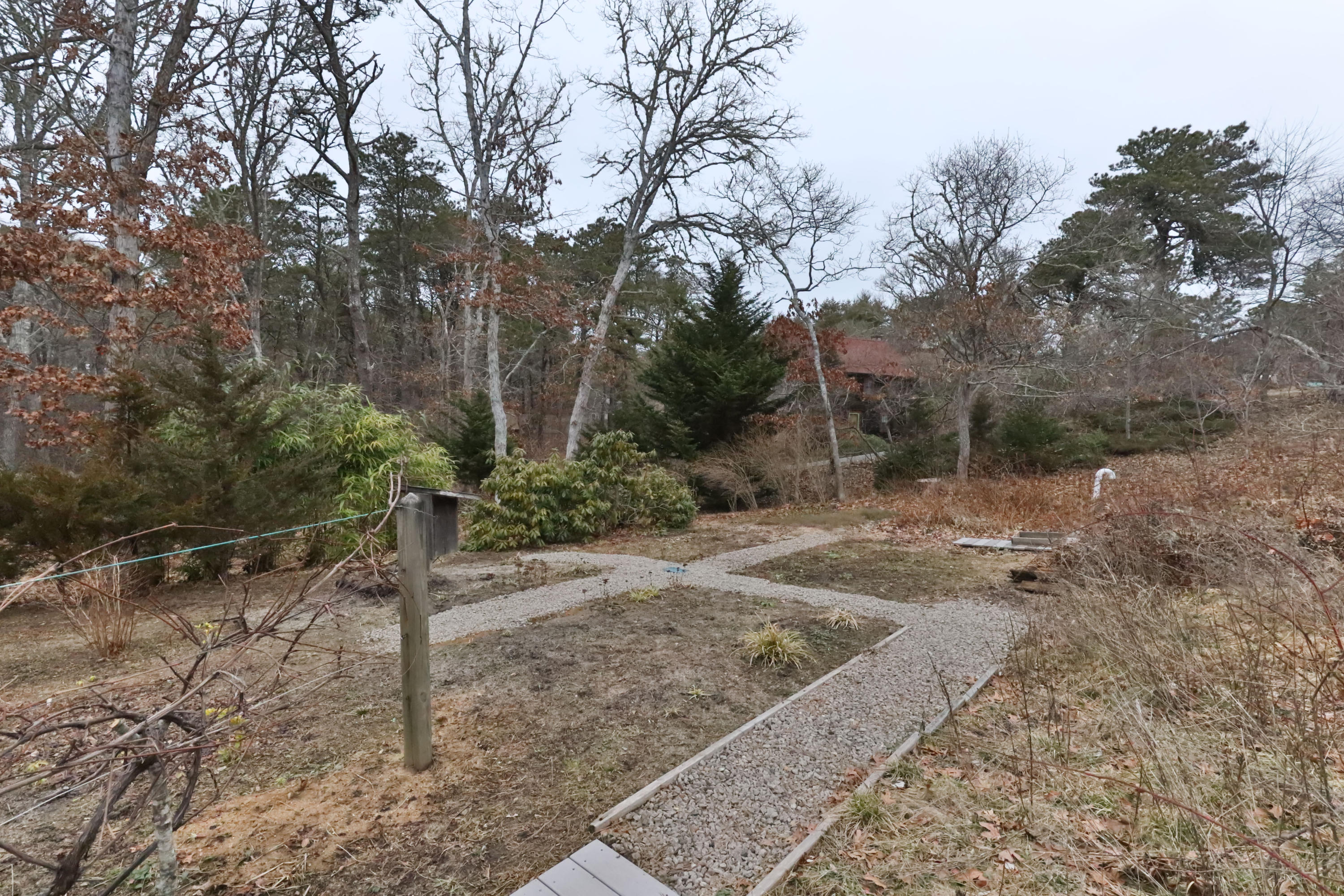 3 Parsons Path Harwich, MA 02645 - Photo 54 of 62 a backyard of a house
